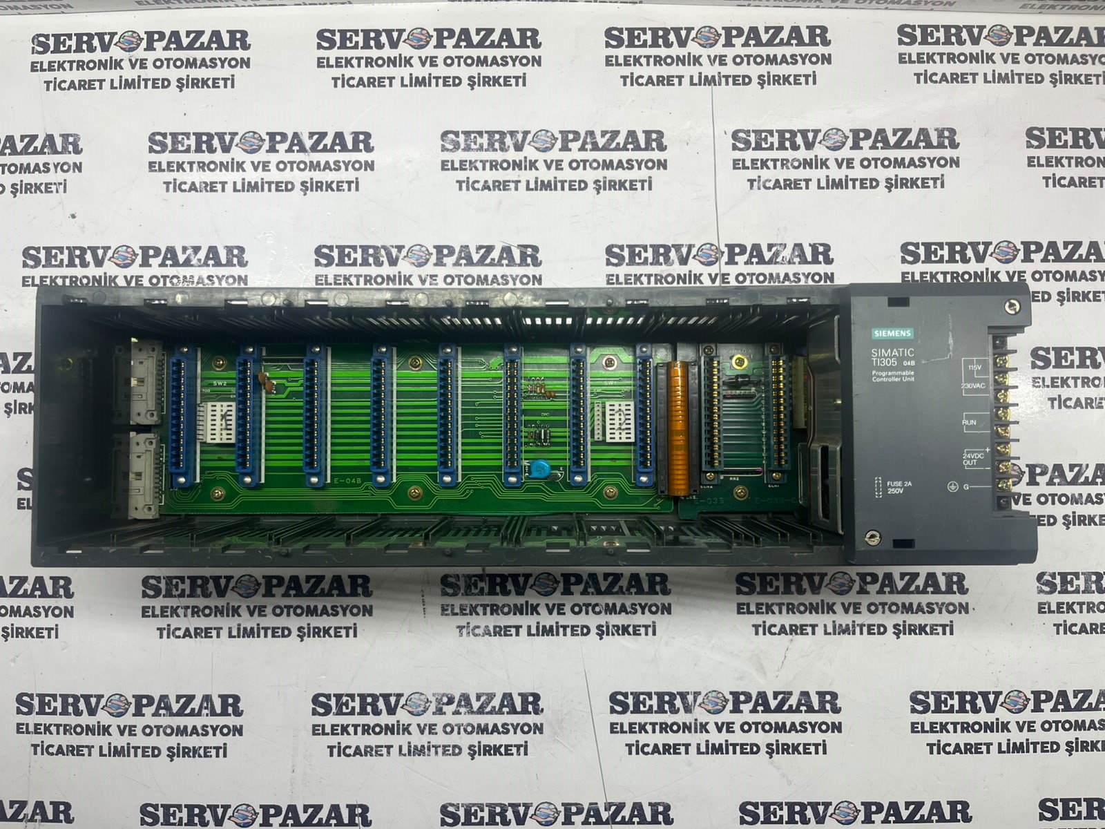 WhatsApp Image 2026-08-06 at 10.01.41 Siemens SIMATIC TI305 04B (305-04B) PLC 4 Slotlu Base Rack / Taban Şasisi – İkinci El